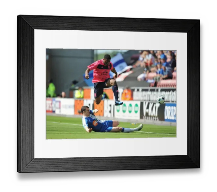 Framed Print : Clash at DW Stadium: Anichebe vs. Caldwell - Everton vs. Wigan Athletic, Premier League Showdown (30 April 2011) Framed Print : Clash at DW Stadium: Anichebe vs. Caldwell - Everton vs. Wigan Athletic, Premier League Showdown (30 April 2011)
