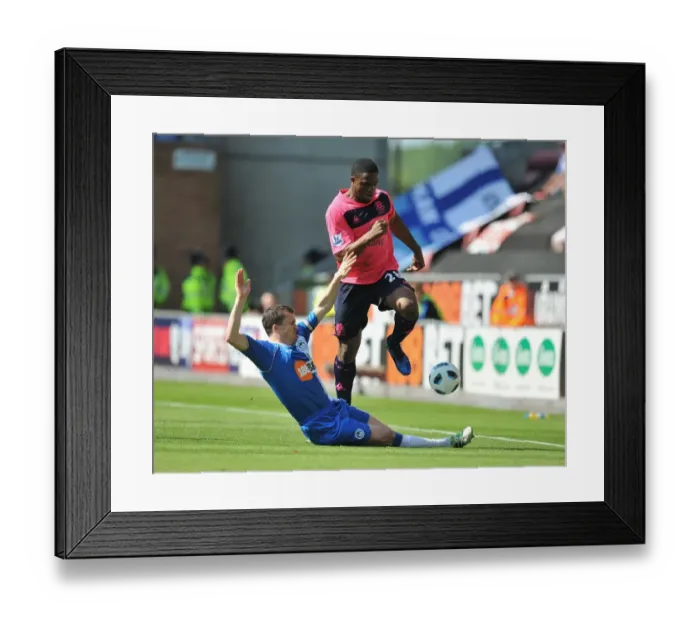 Framed Print : Intense Rivalry: Anichebe vs Caldwell at DW Stadium - Everton vs Wigan Athletic, Barclays Premier League (30 April 2011) Framed Print : Intense Rivalry: Anichebe vs Caldwell at DW Stadium - Everton vs Wigan Athletic, Barclays Premier League (30 April 2011)