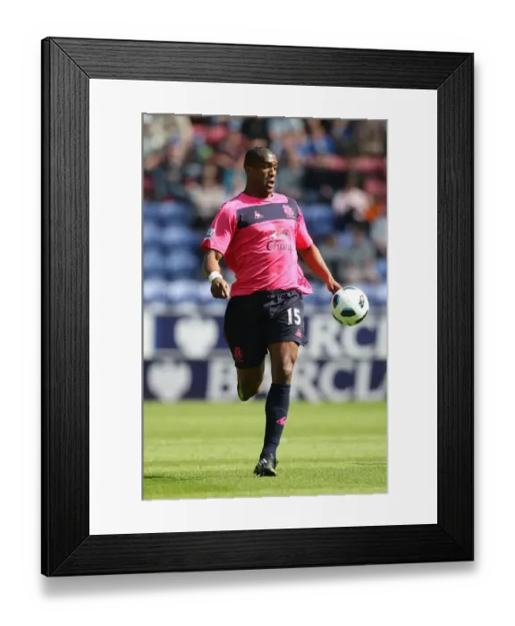 Framed Print : Distin in Action: Everton vs. Wigan Athletic, Barclays Premier League (30 April 2011) Framed Print : Distin in Action: Everton vs. Wigan Athletic, Barclays Premier League (30 April 2011)