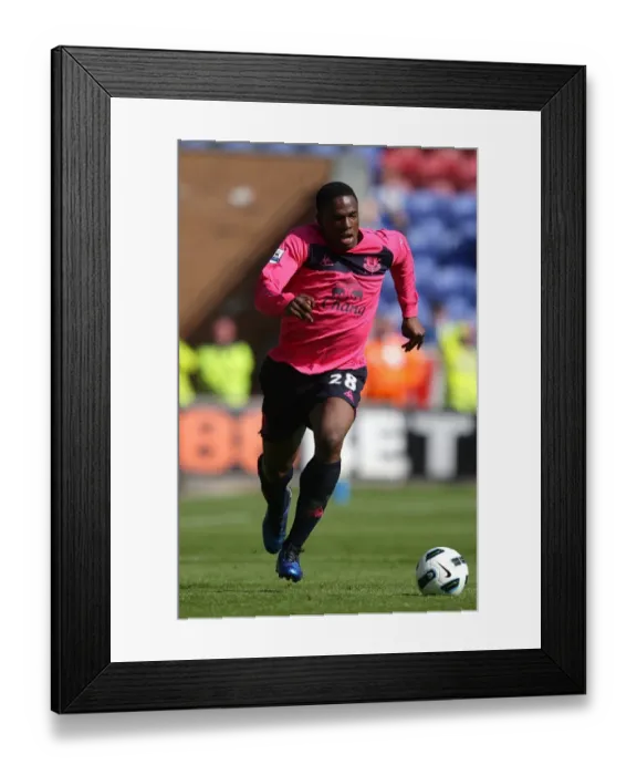 Framed Print : Thrilling Showdown: Victor Anichebe vs. Wigan Athletic (Everton's Exciting Battle in the Barclays Premier League, 30 April 2011) Framed Print : Thrilling Showdown: Victor Anichebe vs. Wigan Athletic (Everton's Exciting Battle in the Barclays Premier League, 30 April 2011)