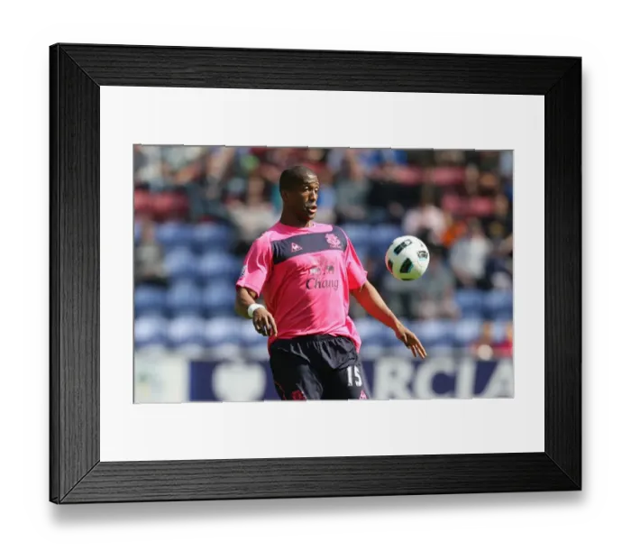 Framed Print : Distin's Determination: Everton vs. Wigan Athletic, Barclays Premier League (30 April 2011) Framed Print : Distin's Determination: Everton vs. Wigan Athletic, Barclays Premier League (30 April 2011)