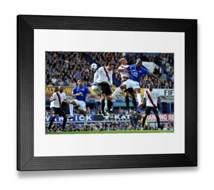 Framed Print : Soaring Anichebe: Everton vs Manchester City's Intense Aerial Battle (07 May 2011, Barclays Premier League) Framed Print : Soaring Anichebe: Everton vs Manchester City's Intense Aerial Battle (07 May 2011, Barclays Premier League)
