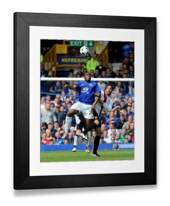 Framed Print : Battle at Goodison Park: Anichebe vs. Lescott - Everton vs. Manchester City (07 May 2011) - Intense Rivalry on the Football Field Framed Print : Battle at Goodison Park: Anichebe vs. Lescott - Everton vs. Manchester City (07 May 2011) - Intense Rivalry on the Football Field