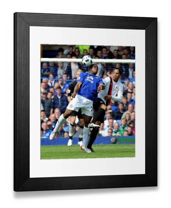 Framed Print : Clash at Goodison Park: Anichebe vs. Lescott - A Premier League Showdown (Everton vs. Manchester City, May 2011)