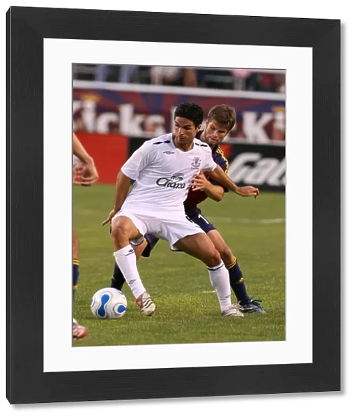 Mikel Arteta Chases the Ball: Everton vs. Real Saltake, 2007