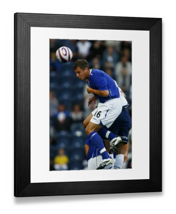 Framed Print : Everton's Phil Jagielka in Action: Pre-Season Friendly vs. Preston North End (2007)