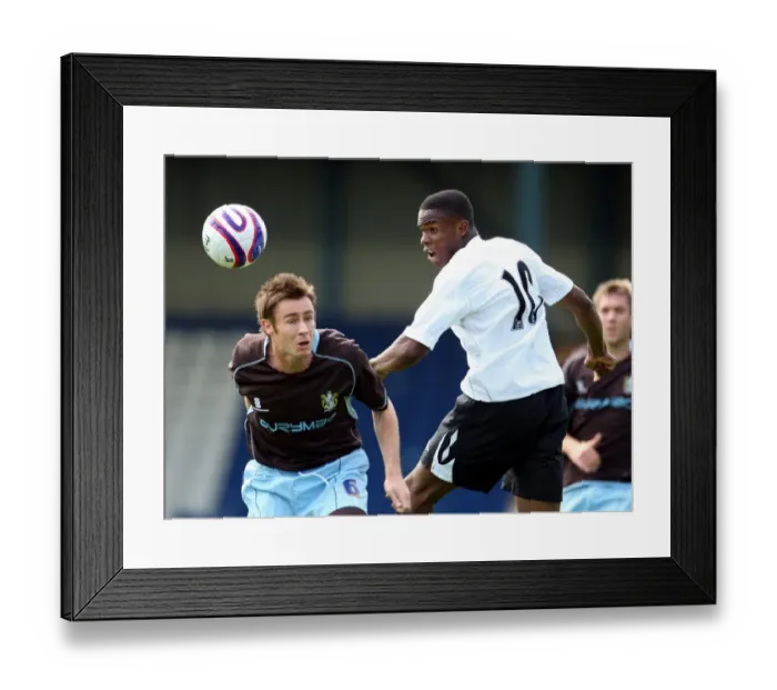 Framed Print : Anichebe vs Morgan: Everton's Star Forward Clashes with Bury Defender in 2007 Pre-Season Friendly Framed Print : Anichebe vs Morgan: Everton's Star Forward Clashes with Bury Defender in 2007 Pre-Season Friendly