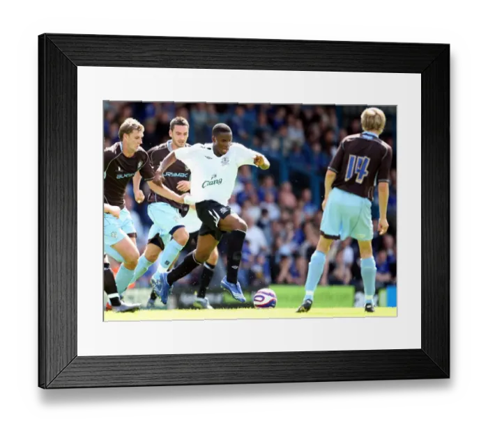 Framed Print : Everton's Victor Anichebe in Action: Pre-Season Thriller at Bury's Gigg Lane (July 2007) Framed Print : Everton's Victor Anichebe in Action: Pre-Season Thriller at Bury's Gigg Lane (July 2007)