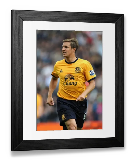 Framed Print : Phil Jagielka Leads Everton in Intense BPL Clash vs. West Bromwich Albion (14 May 2011)