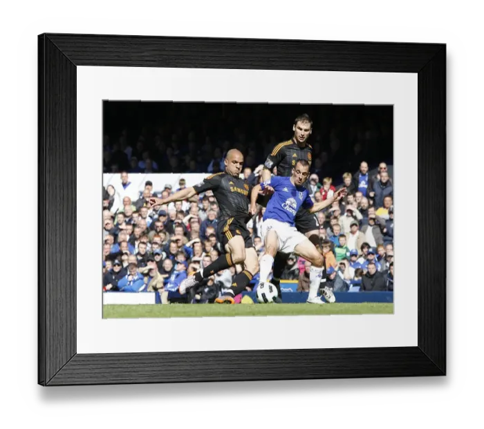 Framed Print : Leon Osman Stands Firm: Intense Battle Between Everton's Osman and Chelsea's Alex and Ivanovic (22 May 2011) Framed Print : Leon Osman Stands Firm: Intense Battle Between Everton's Osman and Chelsea's Alex and Ivanovic (22 May 2011)