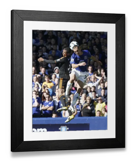 Framed Print : Osman vs. Cole: A Premier League Battle at Goodison Park (22 May 2011) Framed Print : Osman vs. Cole: A Premier League Battle at Goodison Park (22 May 2011)