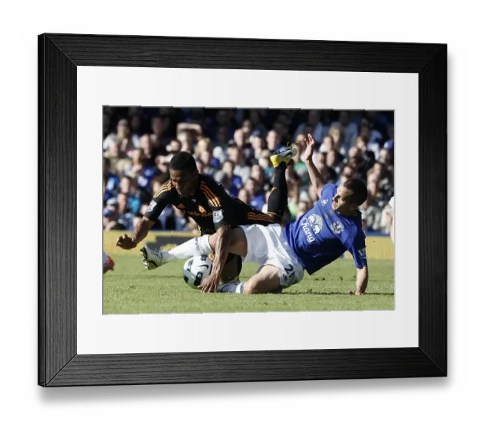 Framed Print : Intense Battle: Osman vs. Malouda at Goodison Park - Everton vs. Chelsea, Premier League (May 2011)