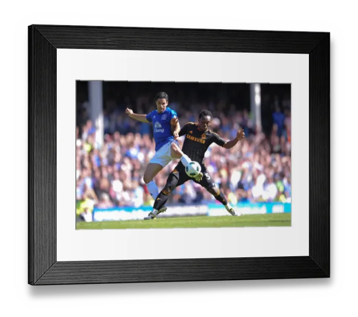 Framed Print : Intense Rivalry: Arteta vs. Essien at Goodison Park - Everton vs. Chelsea, Premier League Showdown (May 2011)