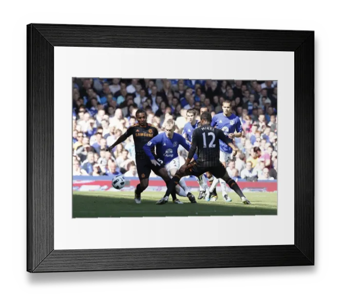 Framed Print : Clash at Goodison Park: Hibbert Stands Ground Against Malouda and Mikel Framed Print : Clash at Goodison Park: Hibbert Stands Ground Against Malouda and Mikel