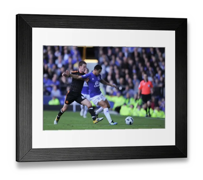 Framed Print : Tim Cahill vs. Josh McEachran: A Battle in the Premier League - Everton vs. Chelsea (2011)