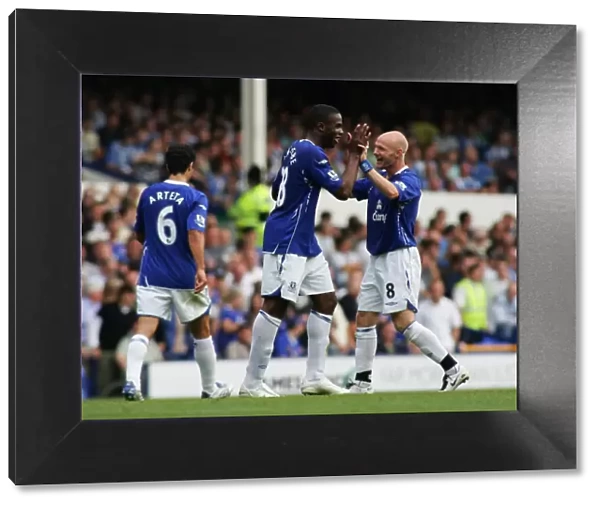 Everton's Double Act: Johnson and Anichebe Celebrate Second Goal vs. Wigan Athletic (August 11, 2007)