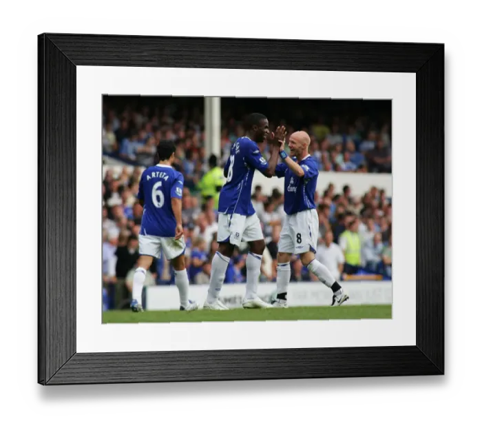 Framed Print : Everton's Double Act: Johnson and Anichebe Celebrate Second Goal vs. Wigan Athletic (August 11, 2007) Framed Print : Everton's Double Act: Johnson and Anichebe Celebrate Second Goal vs. Wigan Athletic (August 11, 2007)
