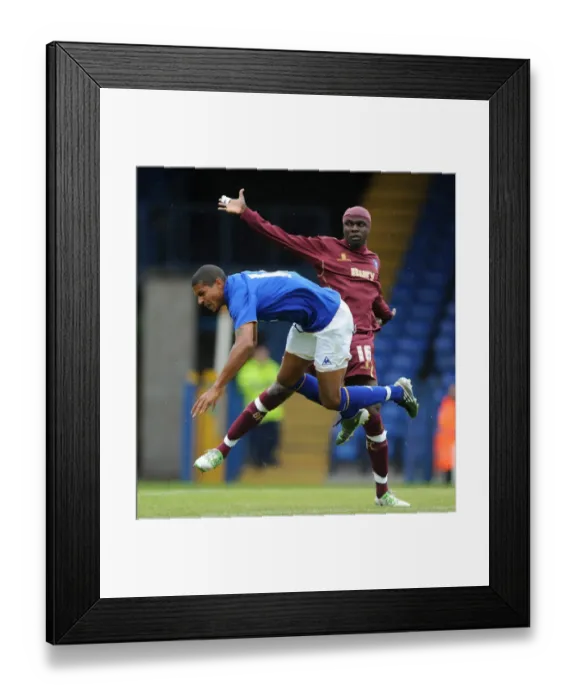 Framed Print : Clash at Gigg Lane: Sodje vs. Beckford - Everton's Pre-Season Battle Framed Print : Clash at Gigg Lane: Sodje vs. Beckford - Everton's Pre-Season Battle