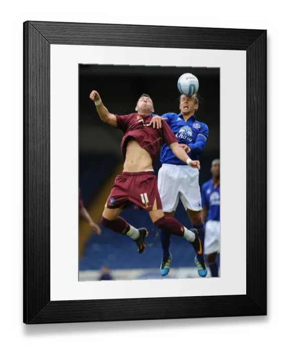 Framed Print : Phil Neville vs. Andy Howarth: Heated Clash in Bury vs. Everton Pre-Season Friendly (July 15, 2011, Gigg Lane) Framed Print : Phil Neville vs. Andy Howarth: Heated Clash in Bury vs. Everton Pre-Season Friendly (July 15, 2011, Gigg Lane)