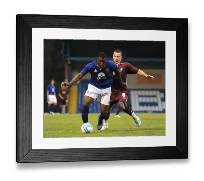 Framed Print : Clash of Titans: Ayegbeni Yakubu vs. Peter Sweeney - Everton vs. Bury (15 July 2011) Framed Print : Clash of Titans: Ayegbeni Yakubu vs. Peter Sweeney - Everton vs. Bury (15 July 2011)