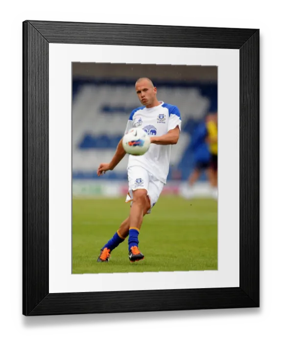 Framed Print : John Heitinga Kicks Off Everton's Pre-Season Training at Bury's Gigg Lane (15 July 2011) Framed Print : John Heitinga Kicks Off Everton's Pre-Season Training at Bury's Gigg Lane (15 July 2011)