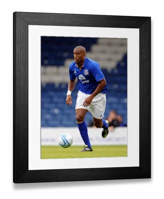 Framed Print : Sylvain Distin in Action: Everton FC vs. Bury (15 July 2011)