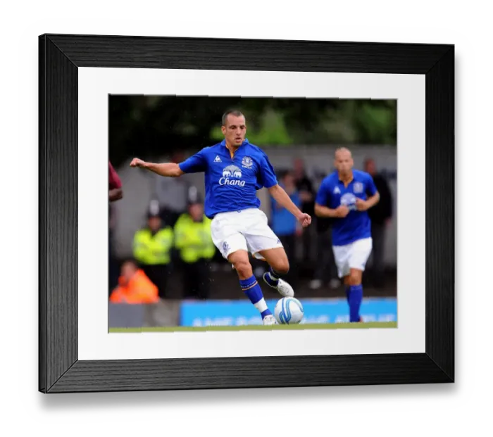 Framed Print : Leon Osman in Action: Everton's Pre-Season Battle against Bury (15 July 2011) Framed Print : Leon Osman in Action: Everton's Pre-Season Battle against Bury (15 July 2011)