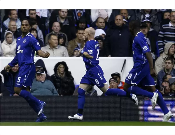 Everton's Historic First Goal of the 07-08 Season: Lescott, Johnson, and Anichebe Celebrate at White Hart Lane Against Tottenham Hotspur