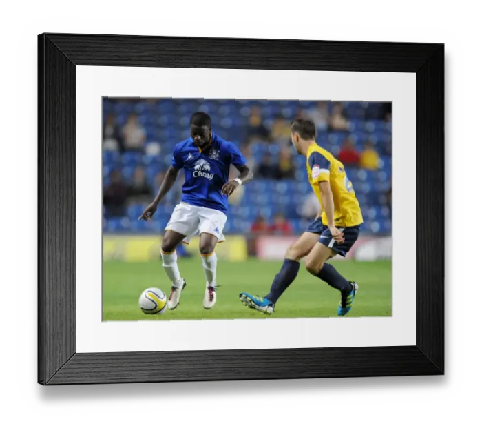 Framed Print : Clash at Kassam: Oxford United vs. Everton - Pre-Season Friendly (2011) - A Battle Between Joe Anderson and Femi Oregbiriki Framed Print : Clash at Kassam: Oxford United vs. Everton - Pre-Season Friendly (2011) - A Battle Between Joe Anderson and Femi Oregbiriki
