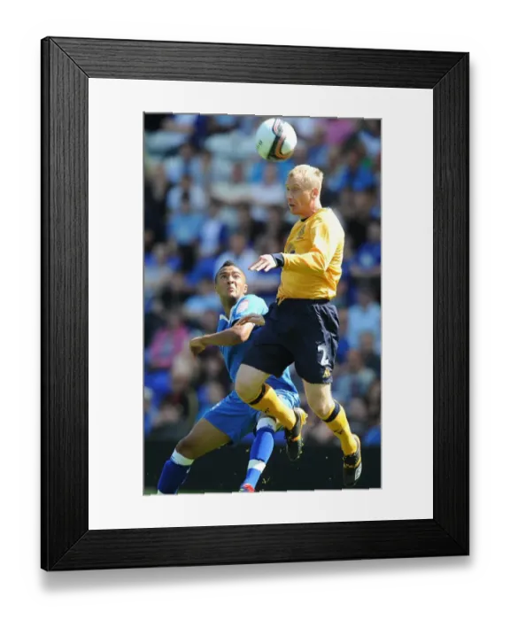 Framed Print : Everton's Tony Hibbert Defies Gravity: Soaring Above Birmingham's Nathan Redmond in Pre-Season Clash Framed Print : Everton's Tony Hibbert Defies Gravity: Soaring Above Birmingham's Nathan Redmond in Pre-Season Clash