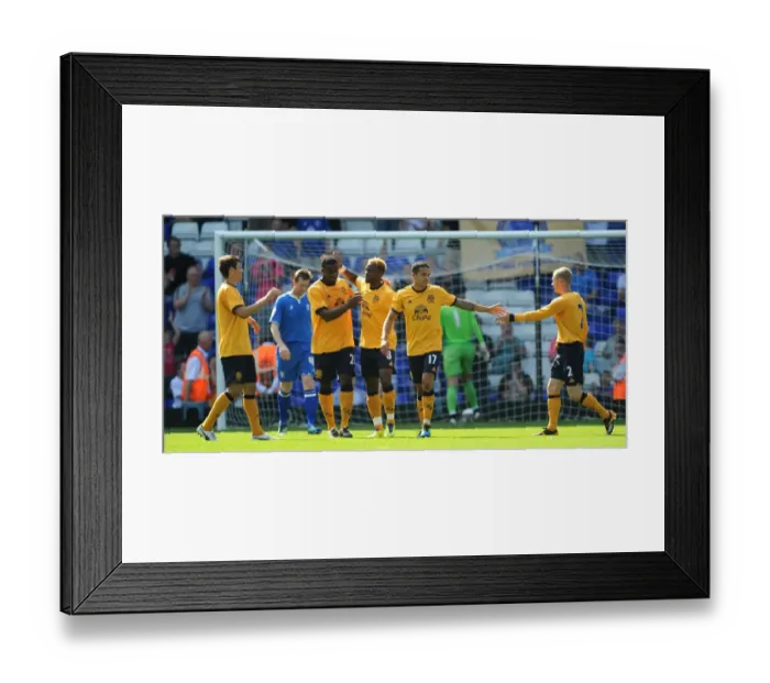 Framed Print : Everton's Louis Saha: Relishing in His Goal Against Birmingham City (July 30, 2011)