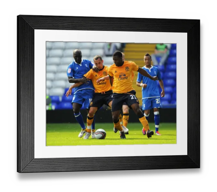 Framed Print : Morgaro Gomis vs. Osman and Yakubi: Intense Battle for the Ball in Birmingham City vs. Everton Pre-Season Friendly (July 2011) Framed Print : Morgaro Gomis vs. Osman and Yakubi: Intense Battle for the Ball in Birmingham City vs. Everton Pre-Season Friendly (July 2011)
