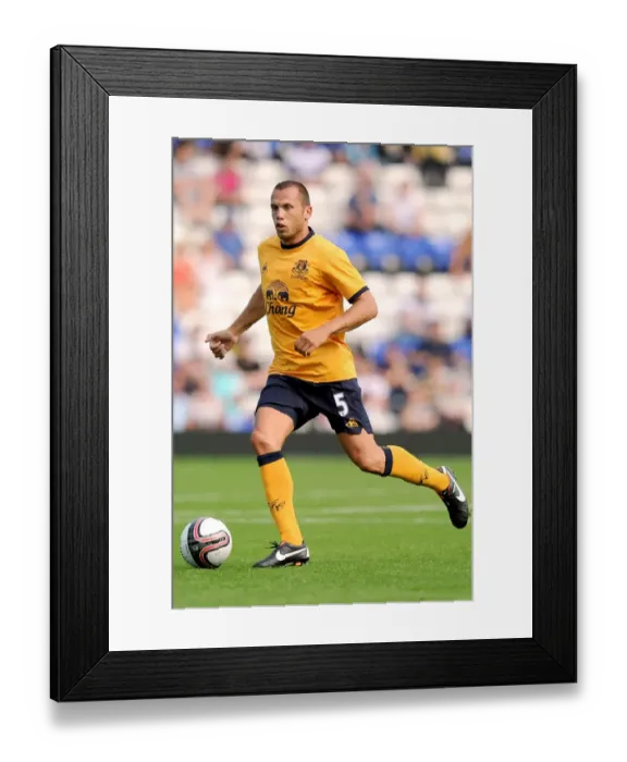 Framed Print : Everton's John Heitinga in Action: Clash with Birmingham City (July 30, 2011)