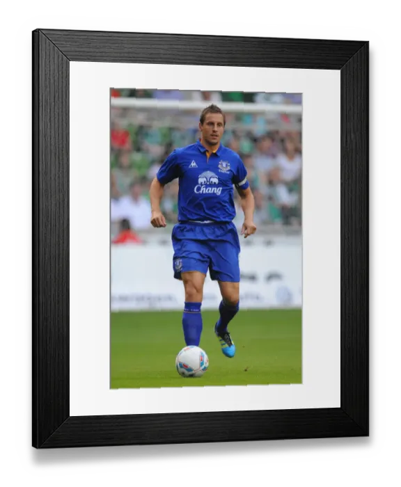 Framed Print : Phil Jagielka Leads Everton at Weserstadion: Pre-Season Friendly Against Werder Bremen (02.08.2011) Framed Print : Phil Jagielka Leads Everton at Weserstadion: Pre-Season Friendly Against Werder Bremen (02.08.2011)