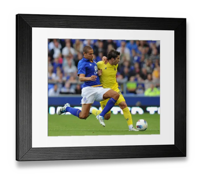 Framed Print : Battle for the Ball: Rodwell vs Cani - Everton vs Villarreal (Pre-Season Friendly, 2011)