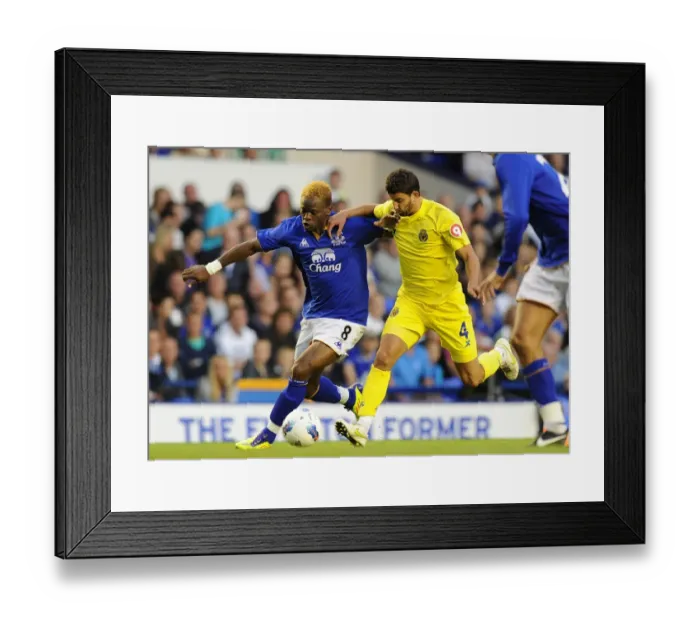 Framed Print : Saha vs. Musacchio: A Riveting Battle at Goodison Park - Everton vs. Villarreal (Pre-Season Friendly, 2011) Framed Print : Saha vs. Musacchio: A Riveting Battle at Goodison Park - Everton vs. Villarreal (Pre-Season Friendly, 2011)