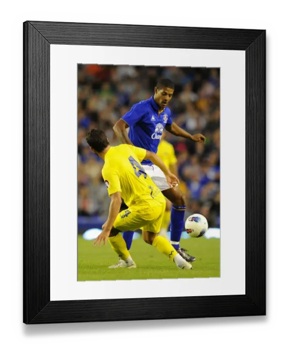 Framed Print : Clash of Titans: Beckford vs Musacchio at Goodison Park (Everton vs Villarreal, 2011) Framed Print : Clash of Titans: Beckford vs Musacchio at Goodison Park (Everton vs Villarreal, 2011)