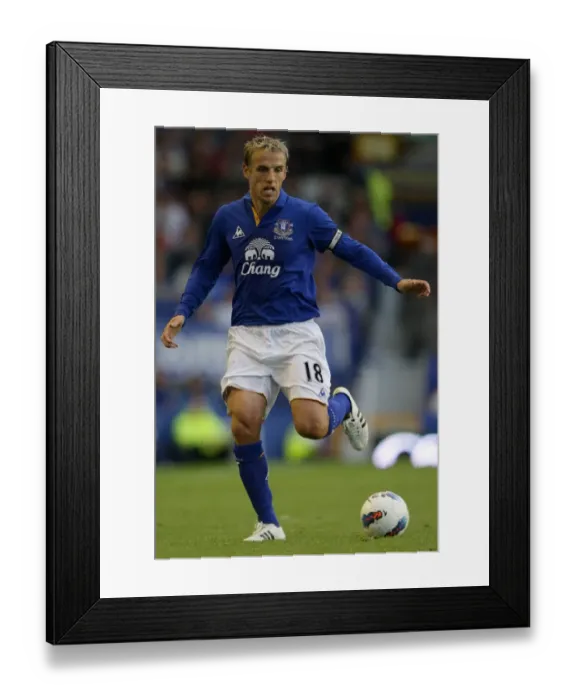 Framed Print : Phil Neville Leads Everton in Pre-Season Clash Against Villarreal at Goodison Park (August 2011)