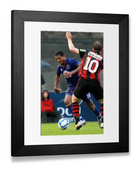 Framed Print : Everton's Jermaine Beckford vs. Bohemians Ger O'Brien: Thrilling Clash in the 2011 Bohemians vs. Everton Friendly at Dalymount Park Framed Print : Everton's Jermaine Beckford vs. Bohemians Ger O'Brien: Thrilling Clash in the 2011 Bohemians vs. Everton Friendly at Dalymount Park