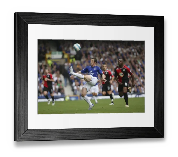 Framed Print : Leighton Baines vs Benni McCarthy: A Premier League Battle at Goodison Park, Everton vs Blackburn Rovers (07 / 08) Framed Print : Leighton Baines vs Benni McCarthy: A Premier League Battle at Goodison Park, Everton vs Blackburn Rovers (07 / 08)