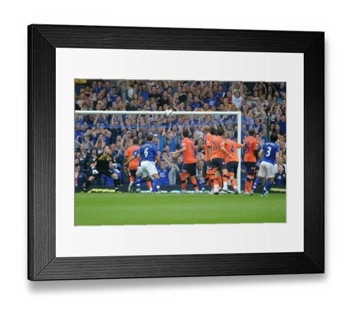 Framed Print : Everton's Leighton Baines Stuns with a Free-Kick Hit off the Bar vs. Queens Park Rangers (2011, Barclays Premier League) Framed Print : Everton's Leighton Baines Stuns with a Free-Kick Hit off the Bar vs. Queens Park Rangers (2011, Barclays Premier League)