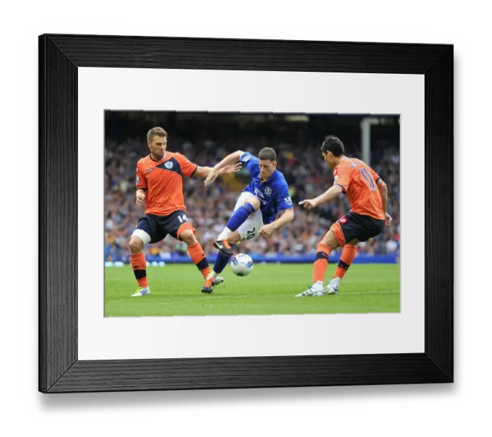 Framed Print : Everton's Ross Barkley Faces Off Against Faurlin and Buzsaky of QPR in Intense Premier League Clash (2011)