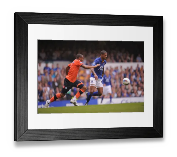 Framed Print : Everton vs. Queens Park Rangers: A Clash at Goodison Park - Beckford vs. Gabbidon (Premier League, 2011)