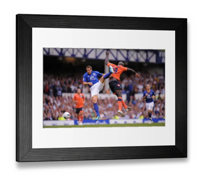 Framed Print : Jagielka vs. Agyemang: A Battle at Goodison Park - Everton vs. Queens Park Rangers, Barclays Premier League (2011)