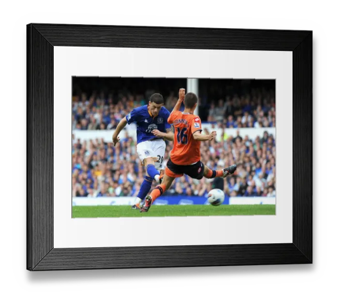 Framed Print : Everton's Ross Barkley Unleashes a Powerful Shot Against Queens Park Rangers (2011)