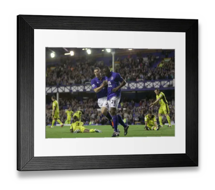 Framed Print : Anichebe and Barkley's Unlikely Celebration: Sheffield United's Own Goal Secures Everton's Carling Cup Victory (2011) Framed Print : Anichebe and Barkley's Unlikely Celebration: Sheffield United's Own Goal Secures Everton's Carling Cup Victory (2011)