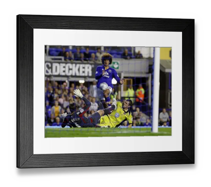 Framed Print : Marouane Fellaini's Failed Goal Attempt vs. Sheffield United in Carling Cup Framed Print : Marouane Fellaini's Failed Goal Attempt vs. Sheffield United in Carling Cup