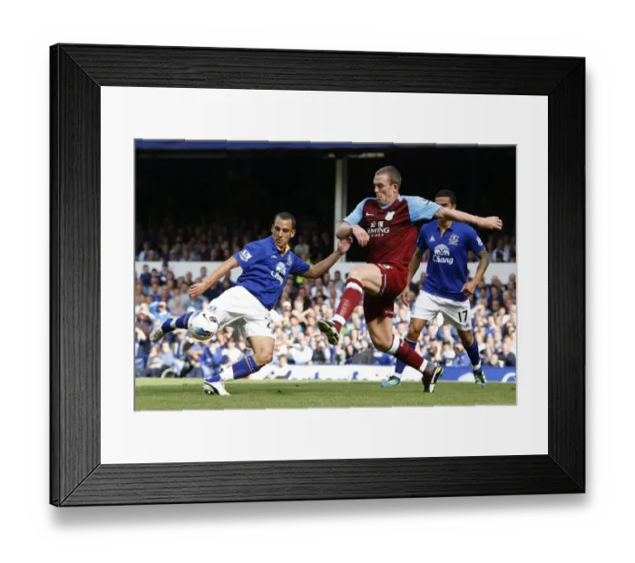 Framed Print : Battle for the Ball: Osman vs. Dunne - Everton vs. Aston Villa, Premier League Rivalry (September 10, 2011)