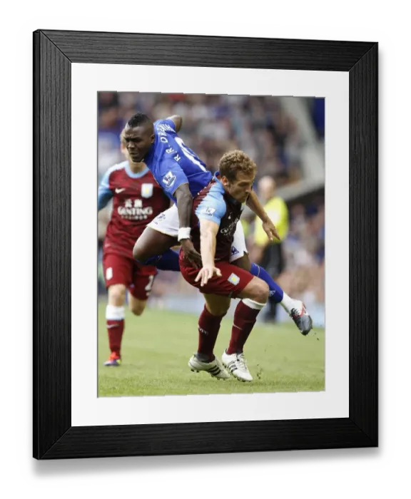Framed Print : Intense Rivalry: Drenthe vs. Petrov Battle at Goodison Park - Everton vs. Aston Villa, Barclays Premier League (2011) Framed Print : Intense Rivalry: Drenthe vs. Petrov Battle at Goodison Park - Everton vs. Aston Villa, Barclays Premier League (2011)