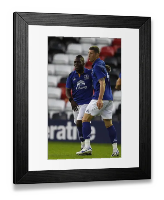 Framed Print : Everton's Ross Barkley and Royston Drenthe: Celebrating Their First Goal Together in Everton vs. Aston Villa Reserve Match (September 13, 2011) Framed Print : Everton's Ross Barkley and Royston Drenthe: Celebrating Their First Goal Together in Everton vs. Aston Villa Reserve Match (September 13, 2011)